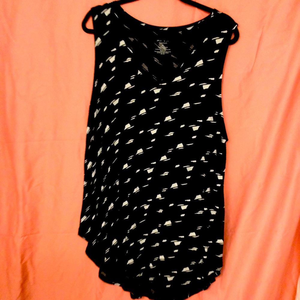 Black and White sleeveless top.